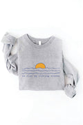 WE RISE BY LIFTING OTHERS Graphic Sweatshirt: ATHLETIC HEATHER